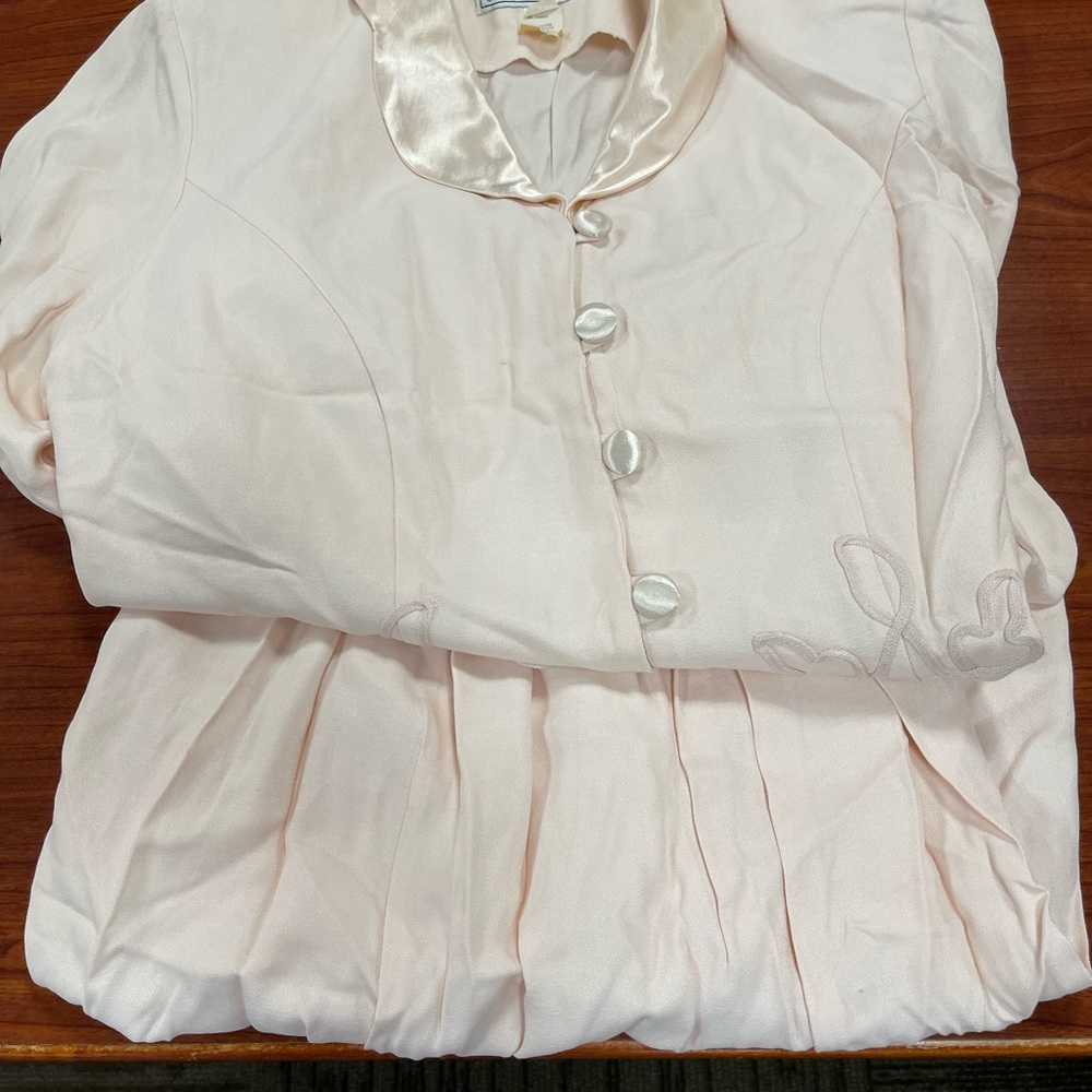 Peach two piece Jessica Howard skirt and jacket.